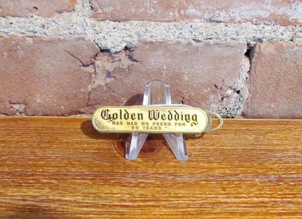 Antique Golden Wedding Pocket Knife Whisky Advertising Push Pull