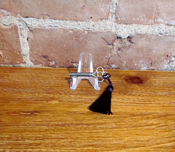 Antique Skeleton Cabinet Door Key And Purple Tassel