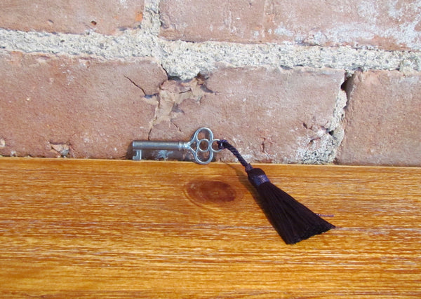 Antique Skeleton Cabinet Door Key And Purple Tassel