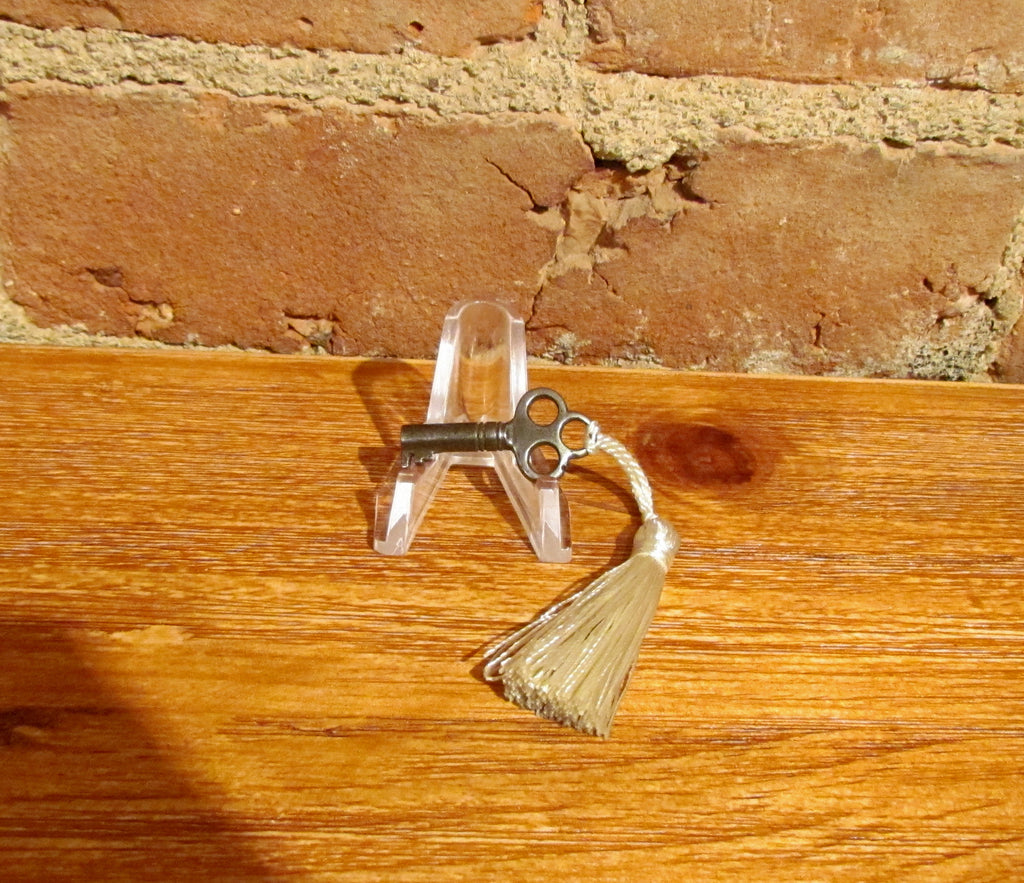 Antique Skeleton Cabinet Key White Tassel