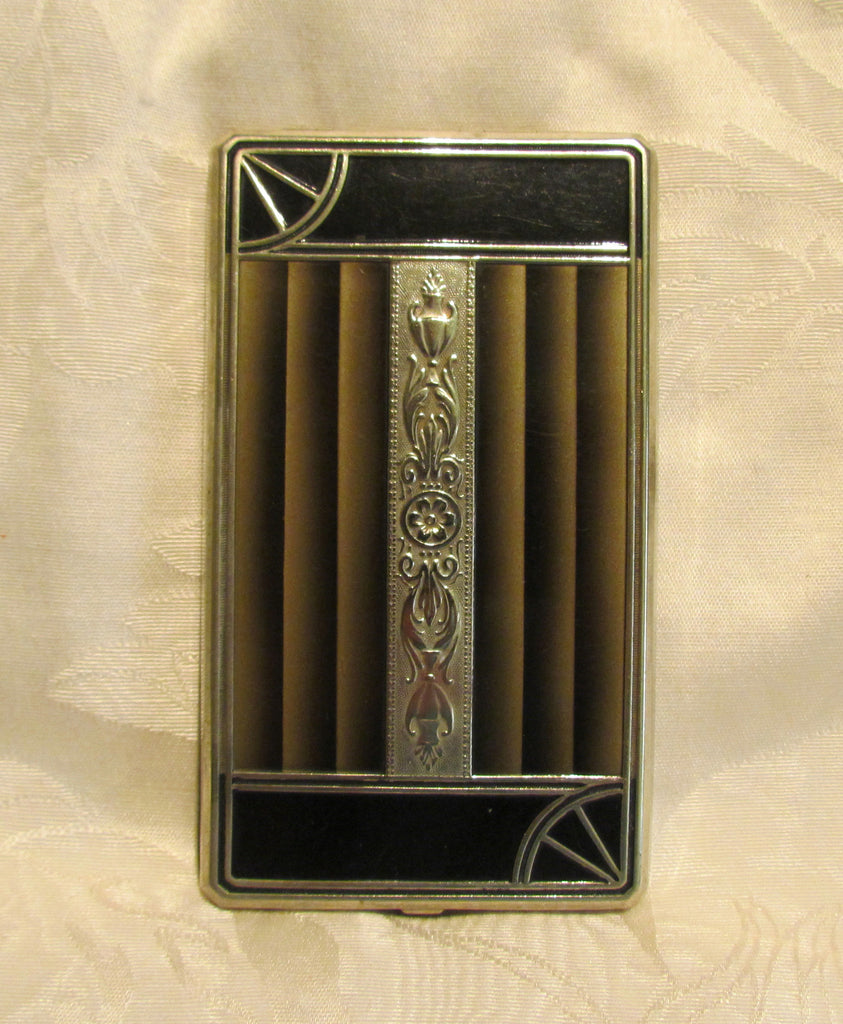 art deco cigarette case Silver Case, 1920s A fabulous Art Deco sterling cigarette case case decorated with engine turned lines and center plaque for engraving Art Deco Gwenda Fluted Gilt