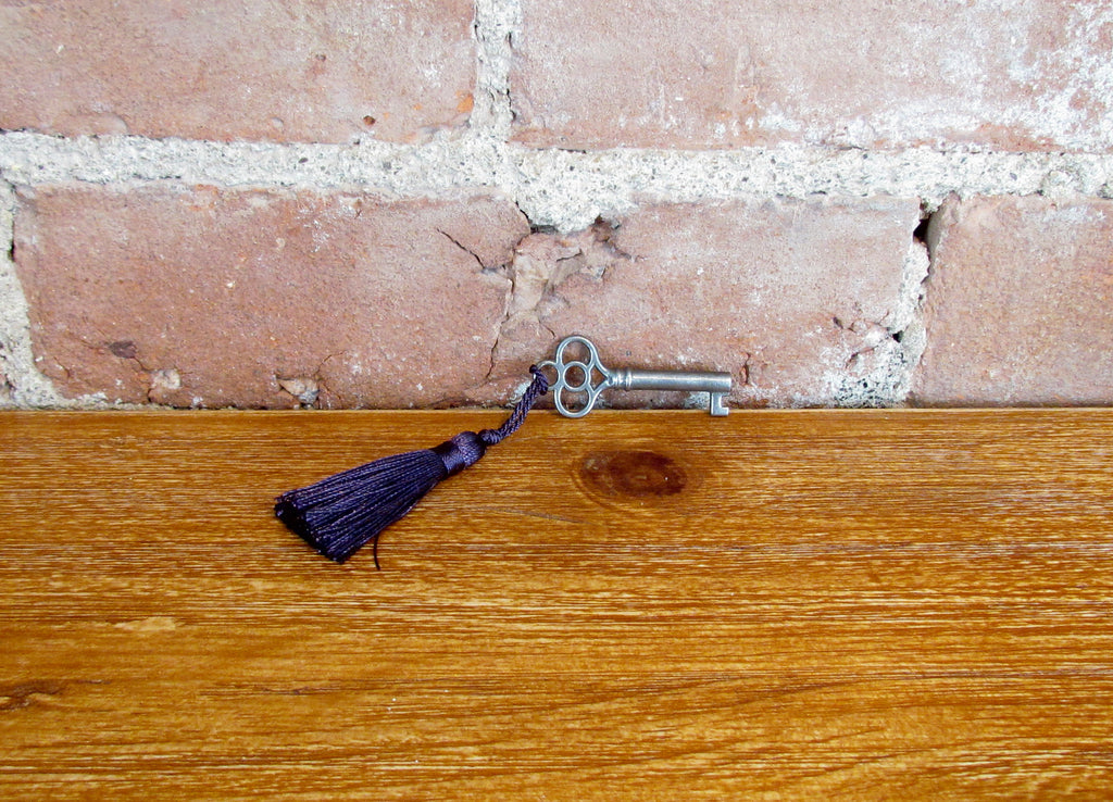 Antique Skeleton Cabinet Door Key And Purple Tassel